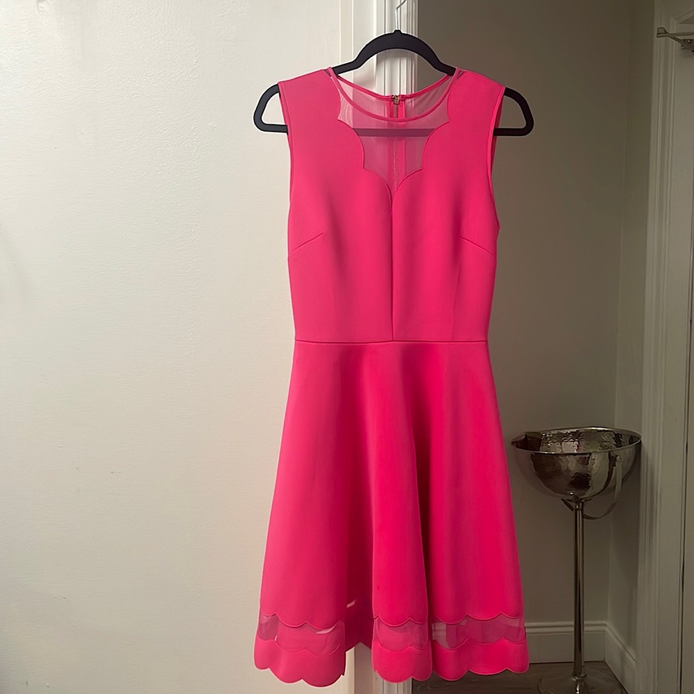 A bright pink sleeveless Ted baker dress in size (a 4 in US women)